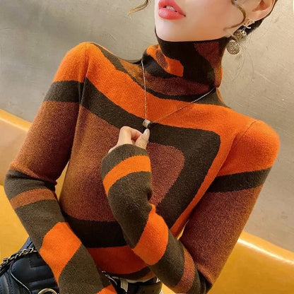 Person wearing a striped sweater with orange and brown colors.