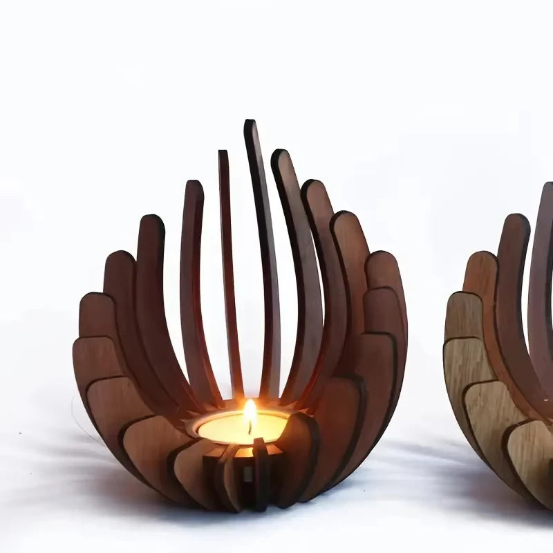 Wooden candle holder with a lit candle on a white background