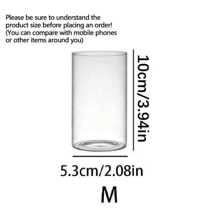 Clear glass cup with dimensions labeled on a white background