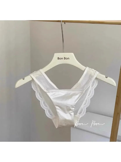 White lace pant on a hanger with 'Bon Bon' branding against a neutral background
