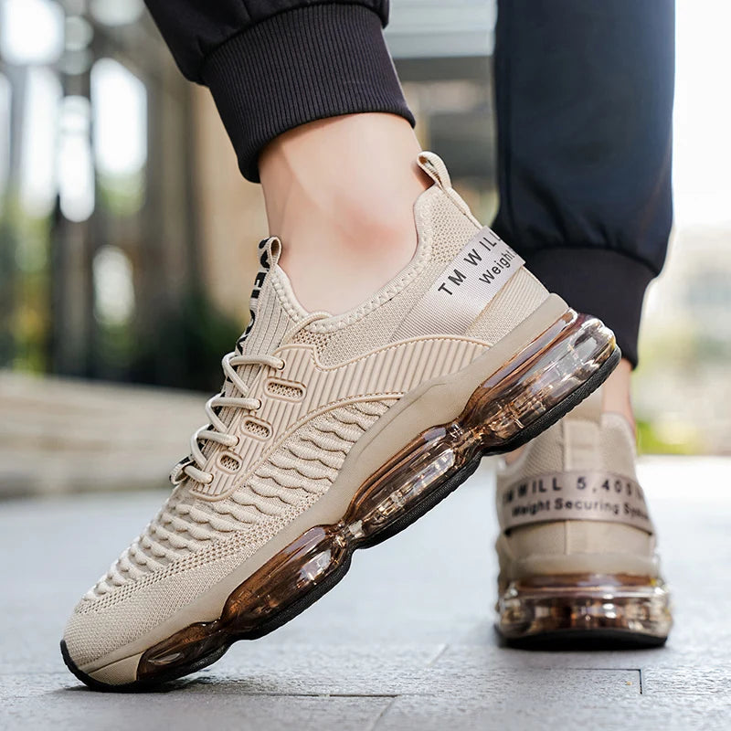 Beige sneakers with transparent air bubbles on a blurred outdoor background