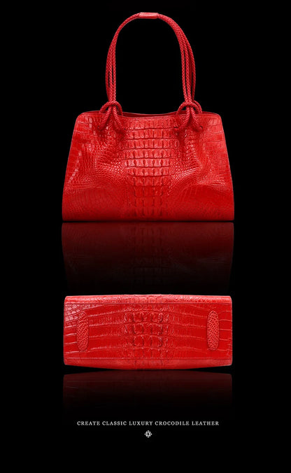 Red crocodile leather handbag and wallet on a black background. Luxury women’s tote bag in genuine red crocodile leather. Large capacity, stylish handle, fashion travel handbag. Perfect for shoulder or portable use UK.