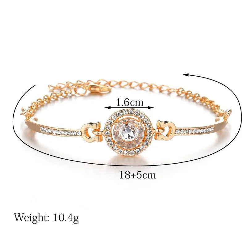 Rose gold bangle bracelet encrusted with clear crystals