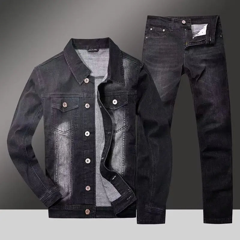 Black denim jacket and jeans on a gray background
