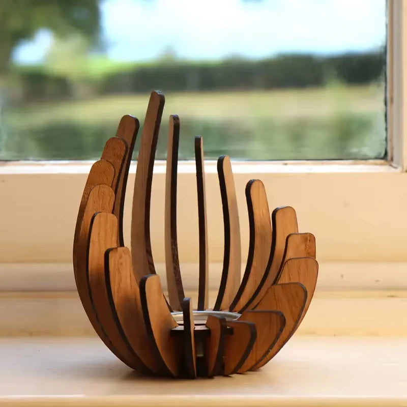 Wooden bowl with a unique design on a wooden surface with a blurred natural background