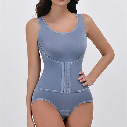 Blue shapewear bodysuit worn by a model on a white background. Women’s slimming bodysuit shapewear with zipper belt. Medium control, wire-free, seamless design with polyester/spandex fabric for all-day comfort.