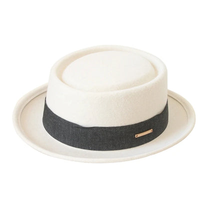 White fedora hat with a black band on a white background. Fedora hat polyester unisex carnival mask, gentleman style, costume accessory, roll trim hat for party and carnival events.