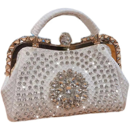 Elegant handbag with crystal embellishments on a white background. Large genuine leather dumpling bag with diamond rhinestone clip and lock clasp. Soft handle, multiple compartments. Fashionable shoulder tote for women.