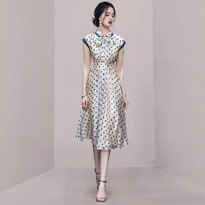 Discover timeless elegance with our Hepburn Vintage Polka Dot Print Bowknot Summer Dress. This mid-calf A-line dress features a charming polka dot pattern, a flattering slim waist, a turn-down collar, sleeveless design, and a decorative bow. Perfect for women aged 25-35 for spring and summer parties. Shop now for classic fashion with a modern twist!