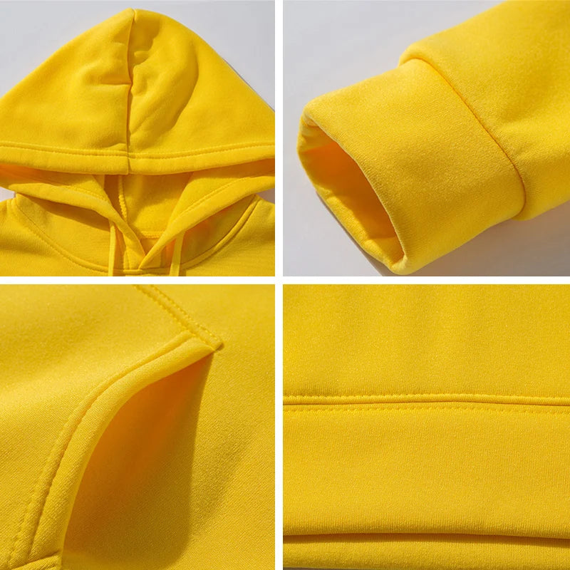 Close-up details of a yellow hoodie on a gray background