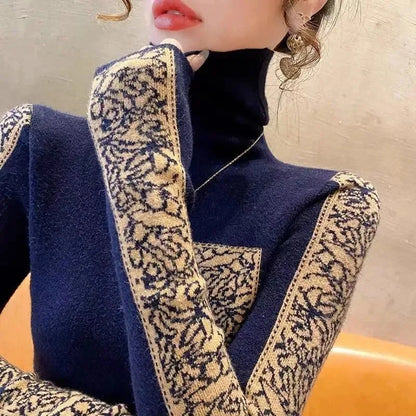 Navy blue garment with intricate gold embroidery on a neutral background