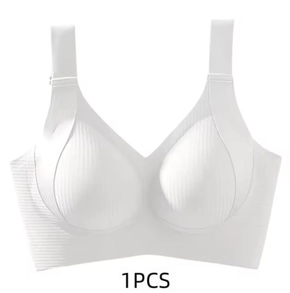 White wireless bra with wide shoulder straps and a smooth underband, shown on a plain white background with '1PCS' text below.