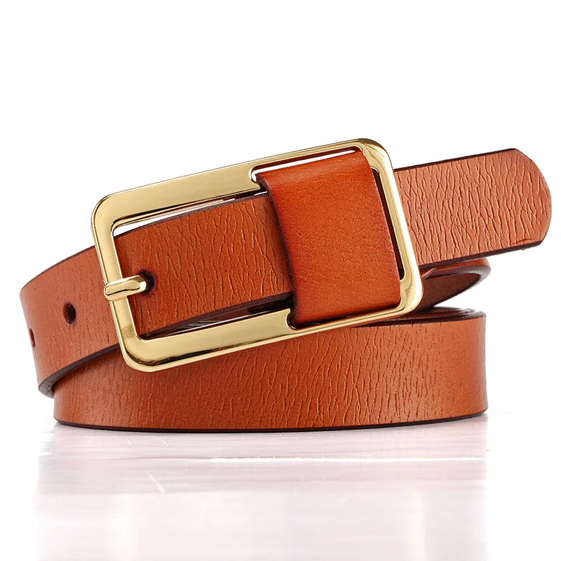 Brown leather belt with a gold buckle on a white background. Women’s wide leather belt with cinched design and metal buckle. Enhances waistline for shirts, dresses, suits. Trendy, durable, UK fashion accessory.