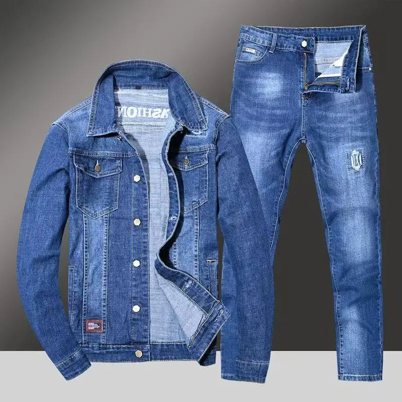 Blue denim jacket and jeans set on a gray background