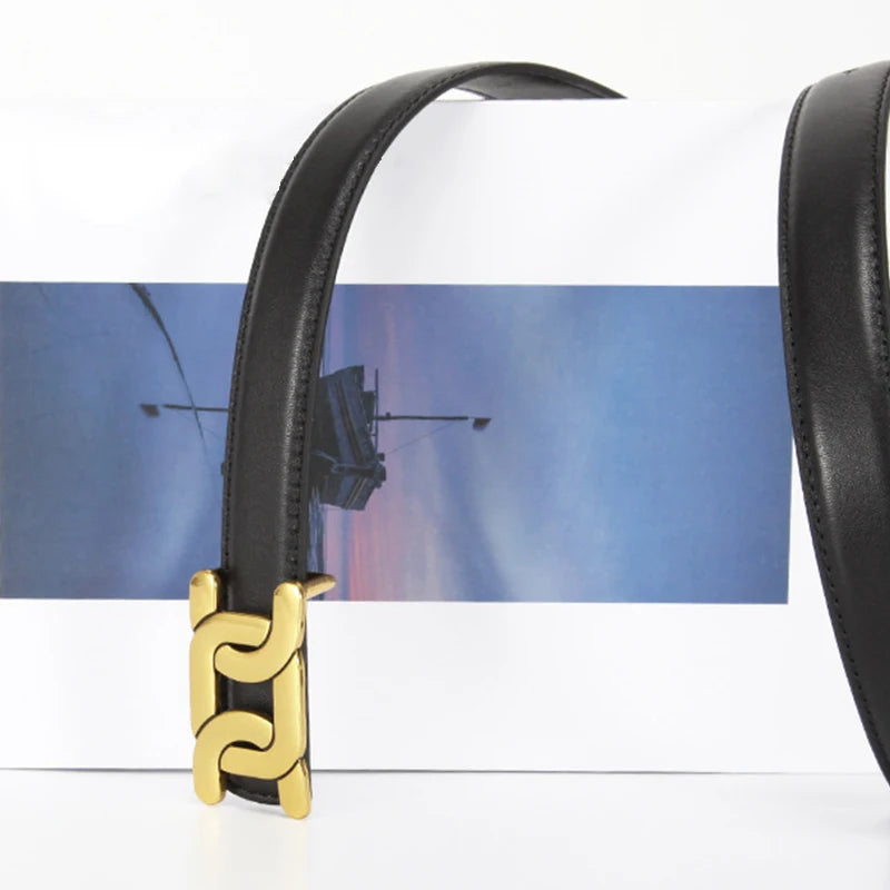 Black belt with a gold buckle on a white background. Women’s retro fashion belt with 2.4cm PU strap, solid alloy buckle for jeans, skirts, and pants. Trendy UK accessory for casual and chic looks.