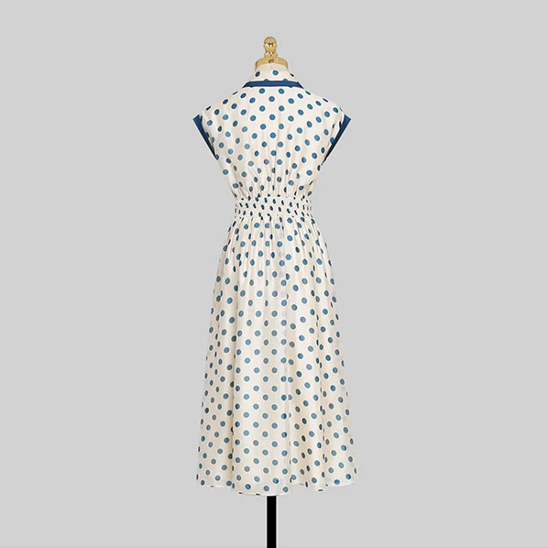 Discover timeless elegance with our Hepburn Vintage Polka Dot Print Bowknot Summer Dress. This mid-calf A-line dress features a charming polka dot pattern, a flattering slim waist, a turn-down collar, sleeveless design, and a decorative bow. Perfect for women aged 25-35 for spring and summer parties. Shop now for classic fashion with a modern twist!