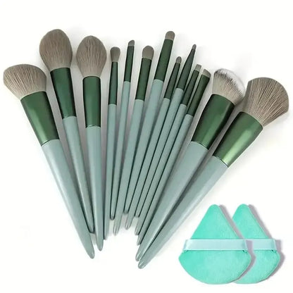 Set of makeup brushes with green and gray handles and a turquoise pouch on a white background. Soft fluffy makeup brush set with wool fiber bristles and plastic handles. Complete set for powder, foundation, eyeshadow, and beauty blending.
