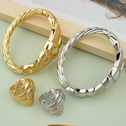 18K gold and silver plated cuff bangle and ring sets side by side showing both colour variants on mint green background