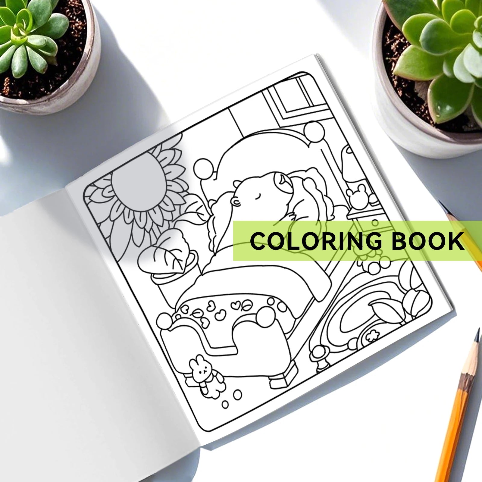 Coloring book open to a page with a design, surrounded by potted plants and a pencil. The Capycuties coloring book is perfect for beginners and pros alike. With simple, adorable patterns, it's a great way to relieve stress and have fun.
