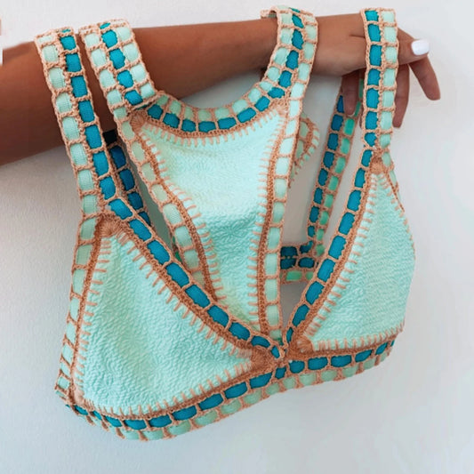 Colourful crochet bikini cover-up held by hand — FTF Market
