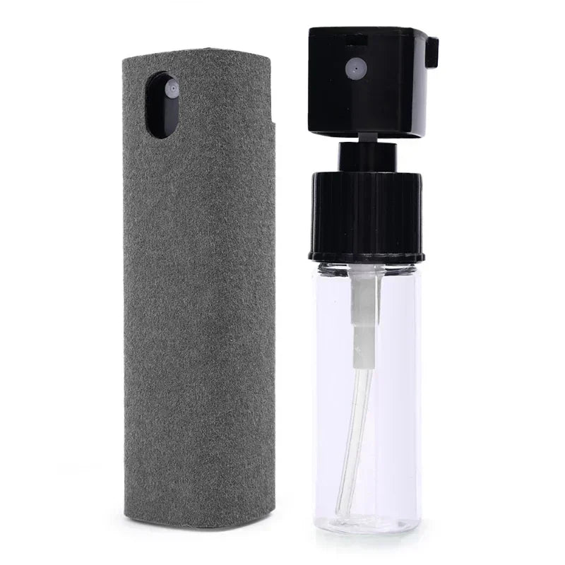 Clear spray bottle with black cap and gray case on a white background. 4in1 microfiber screen cleaner spray with cloth for phones, tablets, computers, glasses. Portable, streak-free, safe for all screens, UK FTF Market.