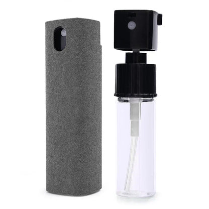 Clear spray bottle with black cap and gray case on a white background. 4in1 microfiber screen cleaner spray with cloth for phones, tablets, computers, glasses. Portable, streak-free, safe for all screens, UK FTF Market.