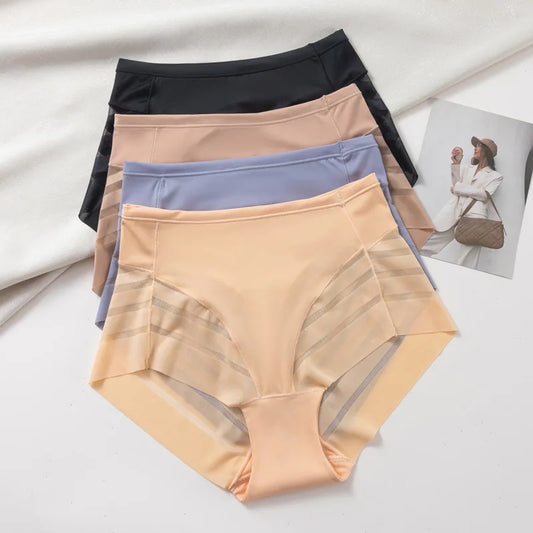 Three pairs of women's underwear in black, beige, and purple on a light background.