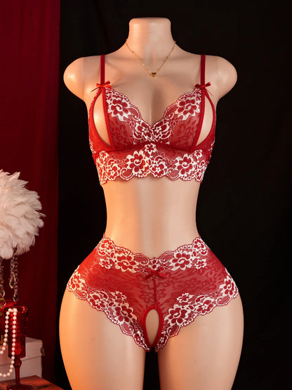 Red lace lingerie set on a mannequin against a dark background