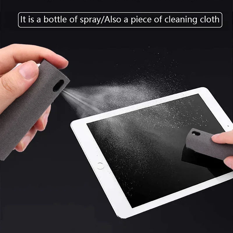 Person cleaning a tablet with a spray bottle and cloth on a black background. 4in1 microfiber screen cleaner spray with cloth for phones, tablets, computers, glasses. Portable, streak-free, safe for all screens, UK FTF Market.