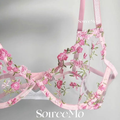 Floral embroidered bra with pink straps on a light gray background, featuring the brand 'SourceMo'.