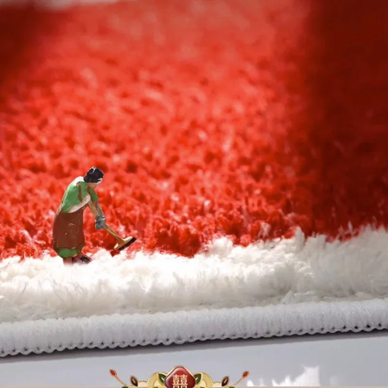 Small figurine of a person snowboarding on a textured red and white surface. Round plush red carpet, soft and thick. Machine-woven, washable, ideal for living room, bedroom, cloakroom. Modern style UK home décor.