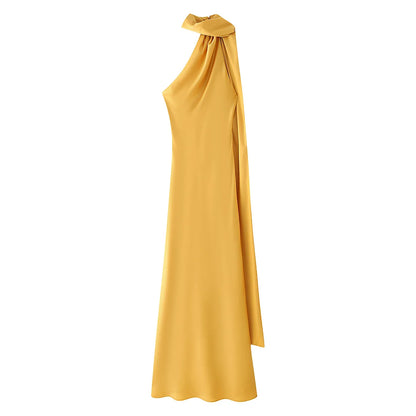 Yellow one-shoulder dress on a white background