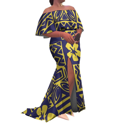 Woman wearing a blue and yellow patterned off-shoulder dress with a slit on a white background