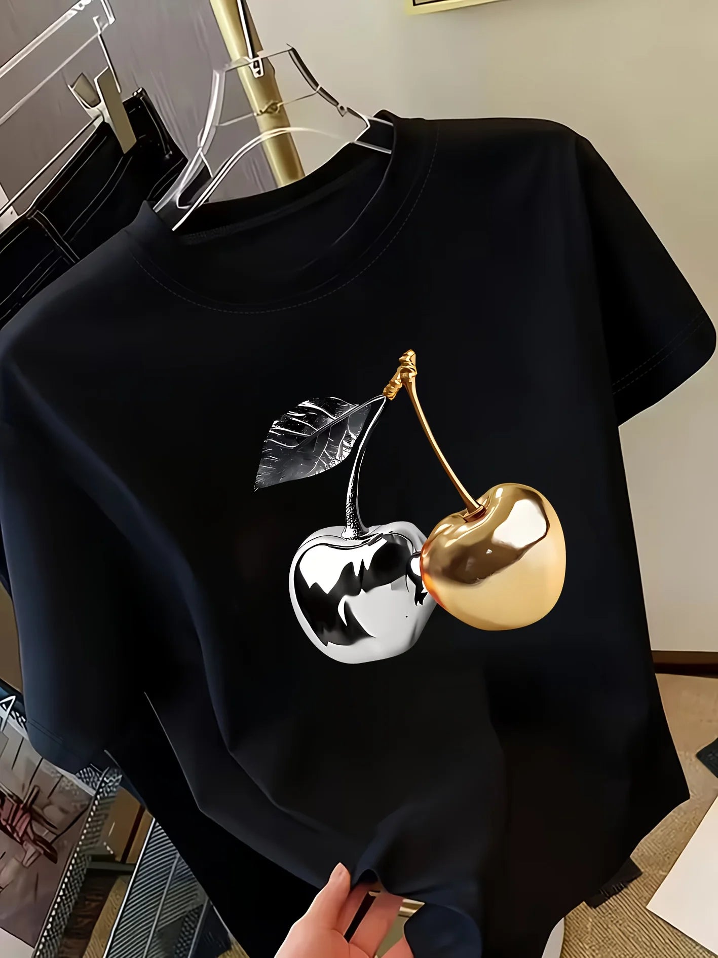 Women's black short sleeve t-shirt with gold and silver metallic cherry print