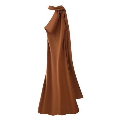 Brown one-shoulder evening gown on a white background
