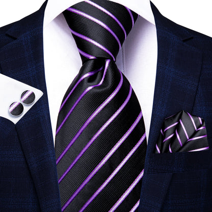 Black tie with purple stripes paired with a navy blazer, white shirt, and pocket square. Men’s luxury paisley silk tie and pocket square set, 8.5cm wide, for business or wedding. Red formal necktie, ftf fashion UK.