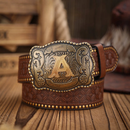 Brown leather belt with gold buckle featuring the letter 'A' on a wooden surface.