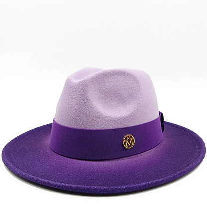 Purple and lavender hat with a purple band and gold emblem on a white background. Unisex double fedora hat, dual color gradient tie-dye, casual jazz style, cotton-polyester mix, suitable for outdoor autumn and spring.
