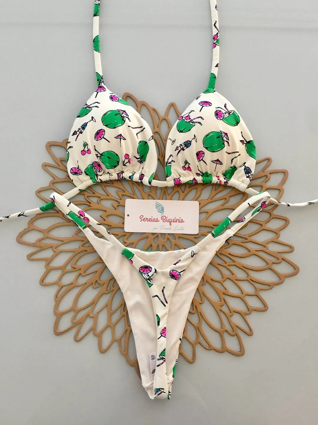 Bikini set with floral pattern on a gray background