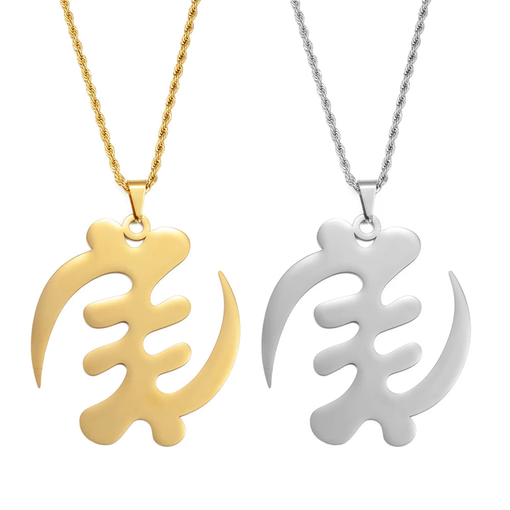 Gold and silver leaf-shaped pendants on white background