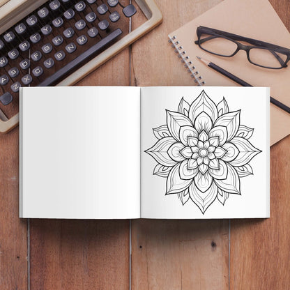 Open notebook with a mandala drawing on a wooden desk with a typewriter, glasses, and pencils. Mandala coloring book for adults, stress relief, relaxation, creative color practice, perfect birthday party gift, UK FTF Market.
