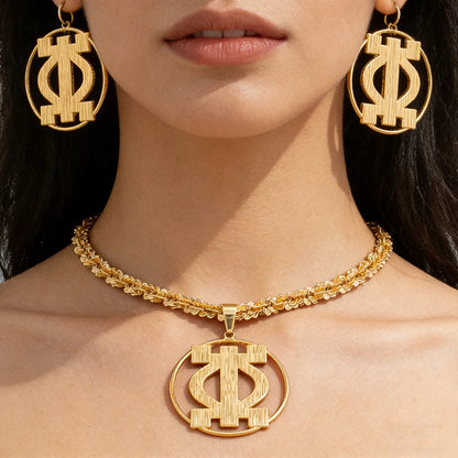 Woman wearing gold statement earrings and twisted rope necklace with African pendant