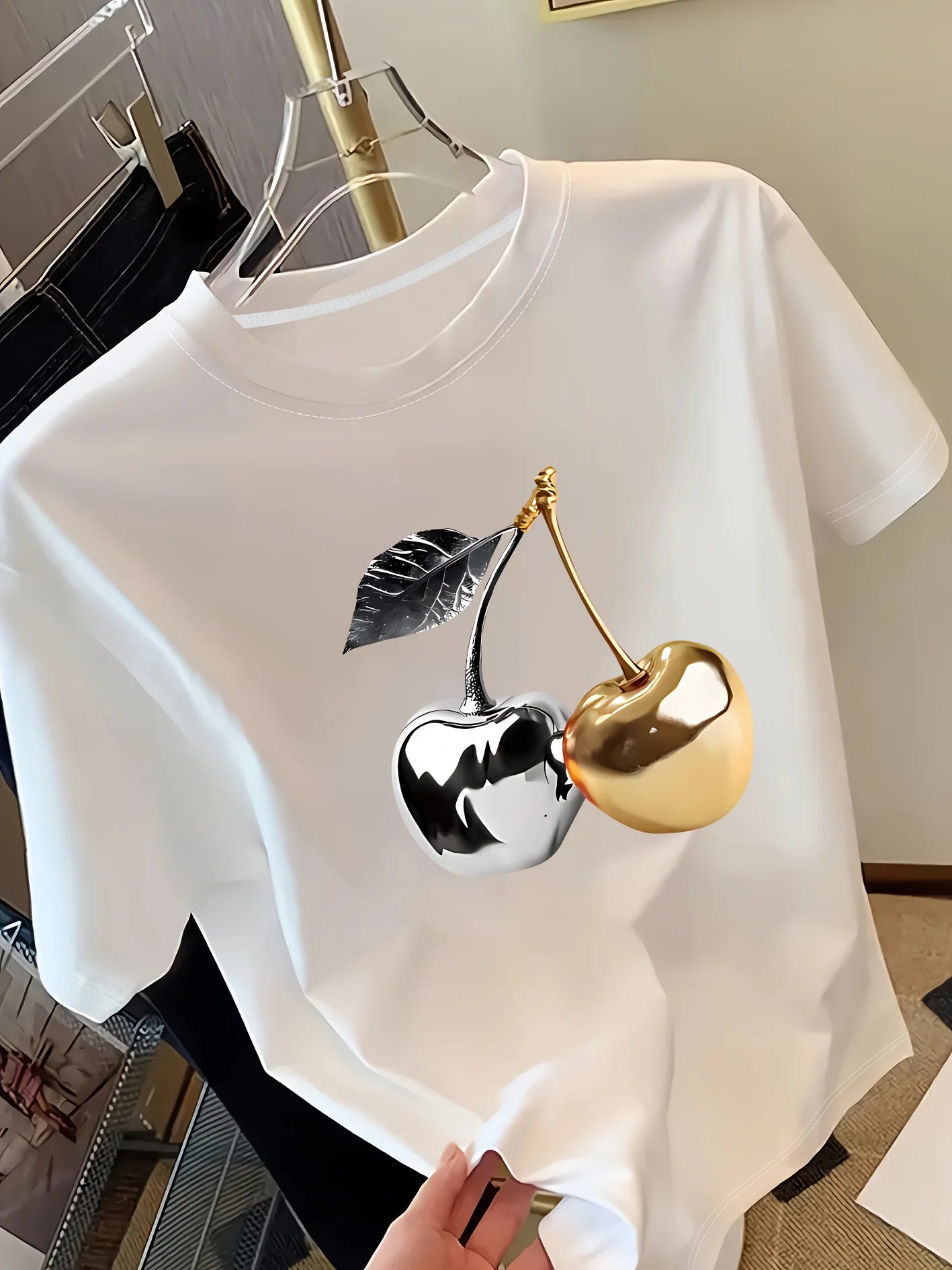 Women's white short sleeve t-shirt with gold and silver metallic cherry print