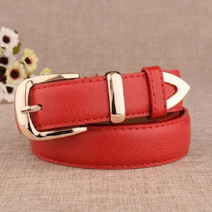 Red leather belt with gold buckle on a beige background. Women’s vintage white leather trouser belt with solid pin buckle. Stylish, high-quality accessory for fashion-forward looks, UK.