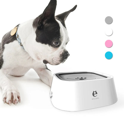 Dog interacting with a white pet water bowl on a white background