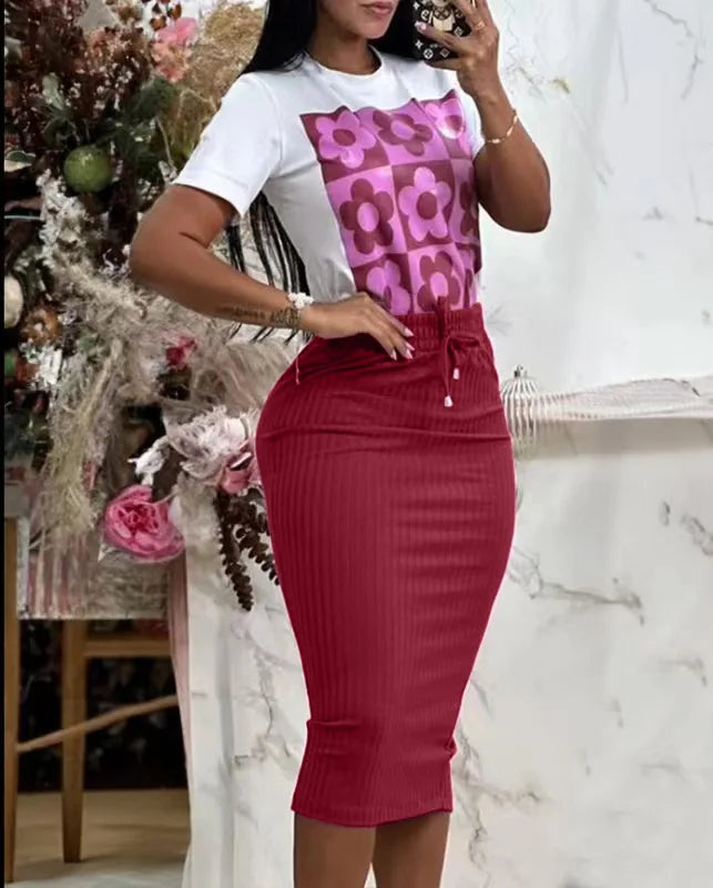 Women’s short sleeve slim printed top with solid color mid-calf skirt set. Broadcloth fabric, casual office dress. Comfortable and stylish two-piece.