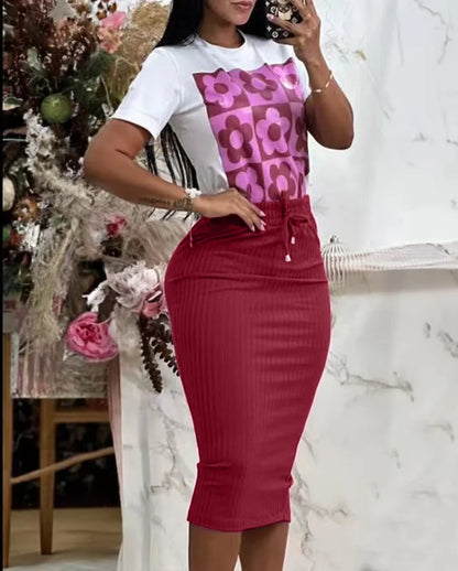 Women’s short sleeve slim printed top with solid color mid-calf skirt set. Broadcloth fabric, casual office dress. Comfortable and stylish two-piece.