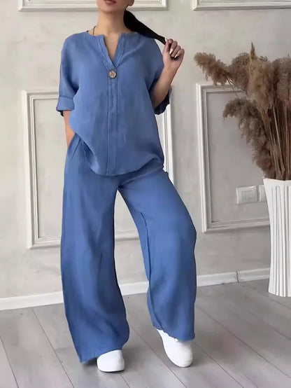Women's casual co-ord set in cow blue — loose blouse and high-waist wide leg trousers...