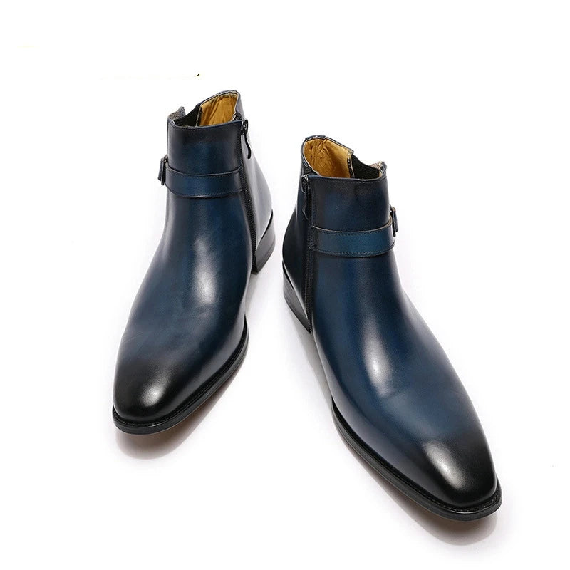 Pair of blue leather boots on a white background