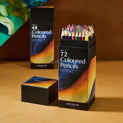 Set of 72 coloured pencils in a box with a visible brand name on a brown surface. Set crayons de couleur bois 12-72 pcs, colorés et vibrants pour dessin, écriture, fournitures scolaires et art. Qualité pro UK FTF Market.